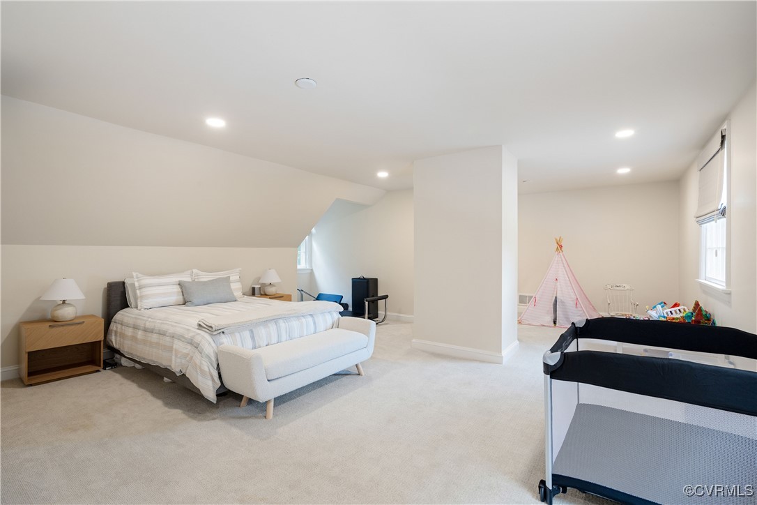 9603 River Road Henrico, VA 23229 - Photo 37 of 50 a bedroom with a bed and a lamp