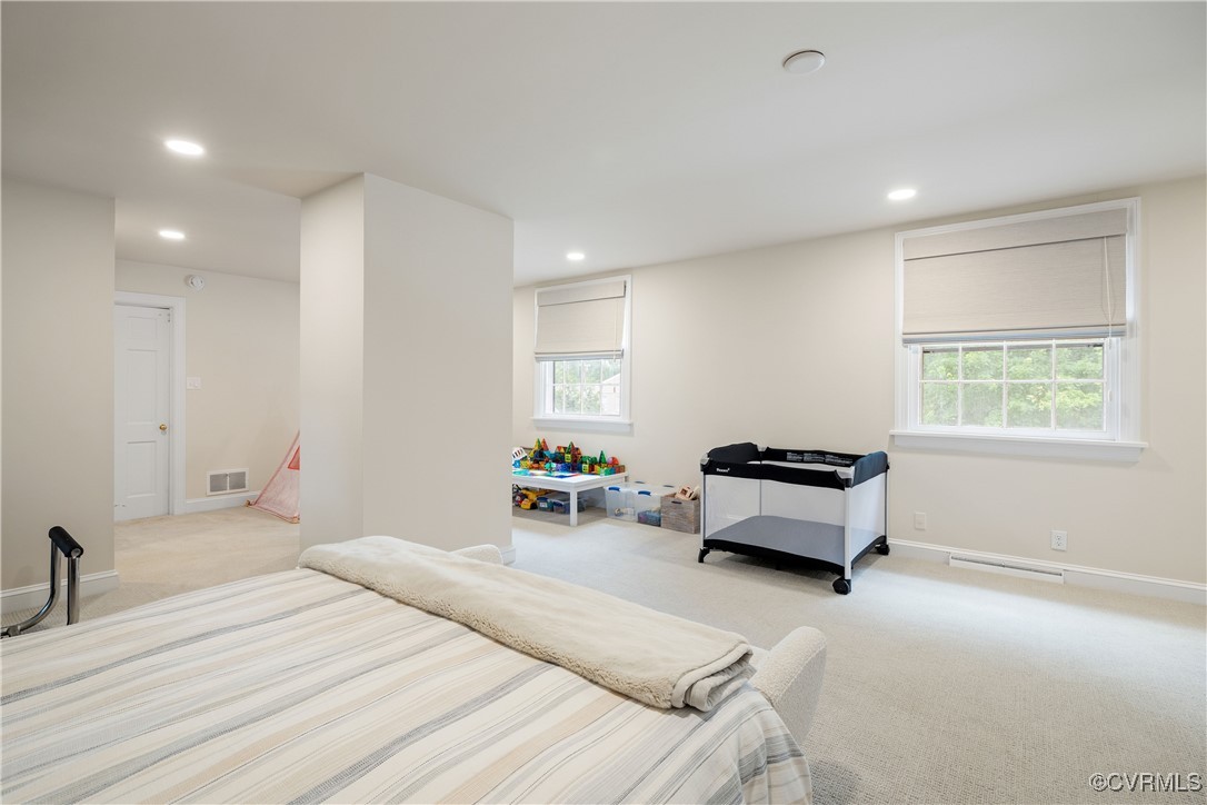 9603 River Road Henrico, VA 23229 - Photo 38 of 50 a bedroom with a bed and a window