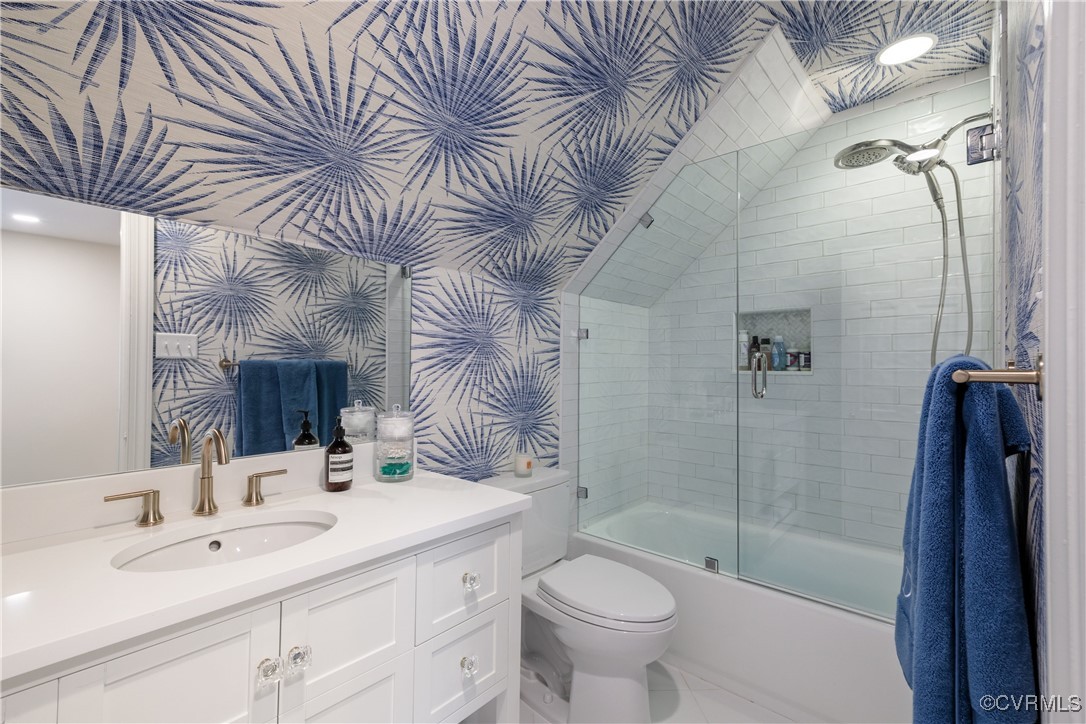 9603 River Road Henrico, VA 23229 - Photo 40 of 50 a bathroom with a sink a toilet and shower