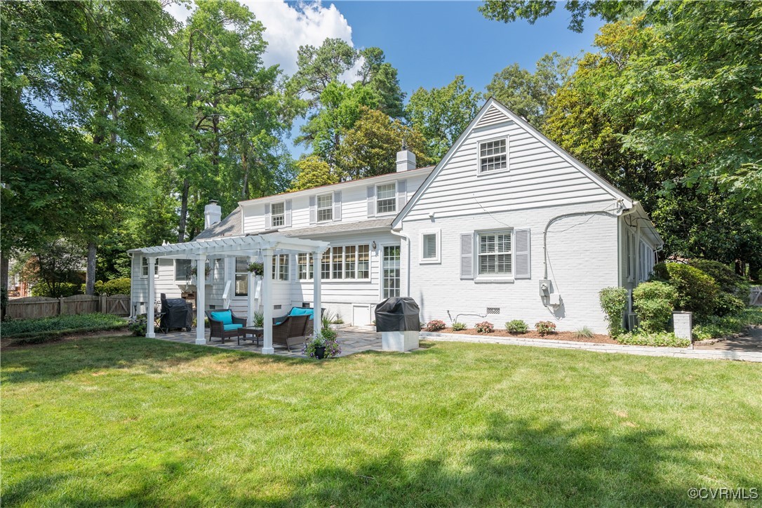 9603 River Road Henrico, VA 23229 - Photo 44 of 50 a view of a house with a big yard and large trees