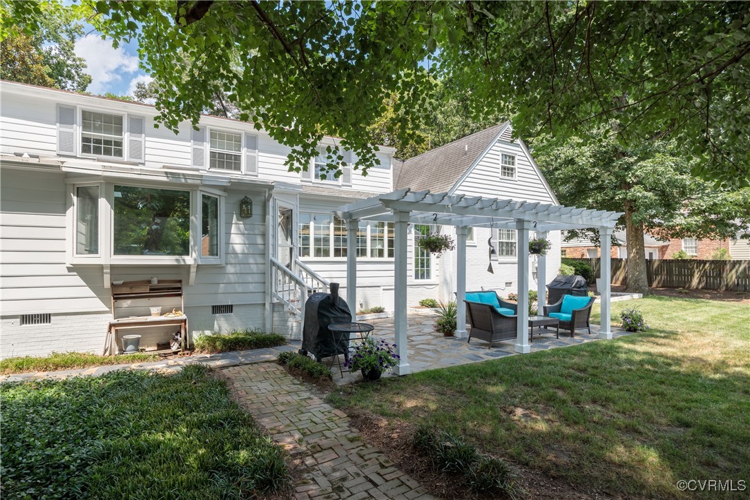 9603 River Road Henrico, VA 23229 - Photo 46 of 50 a view of a house with backyard porch and sitting area