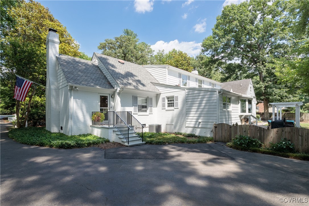 9603 River Road Henrico, VA 23229 - Photo 48 of 50 a front view of a house with a yard and garage