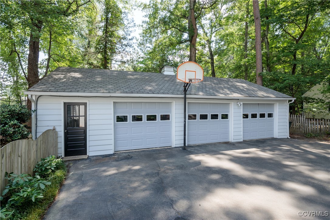 9603 River Road Henrico, VA 23229 - Photo 49 of 50 a front view of a house with a garden