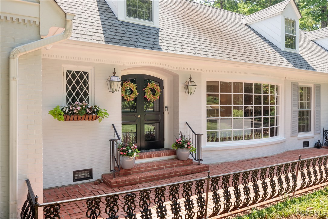 9603 River Road Henrico, VA 23229 - Photo 5 of 50 a front view of a house with a porch