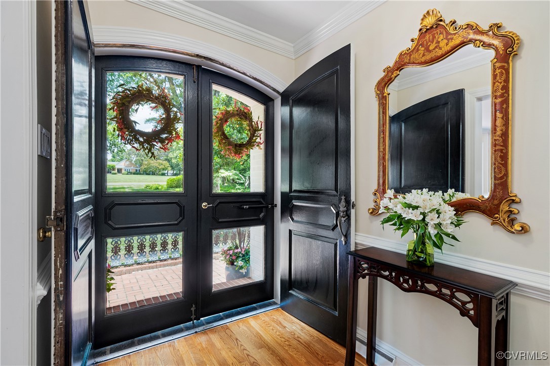 9603 River Road Henrico, VA 23229 - Photo 6 of 50 a view of a room that has a large window and wooden floor