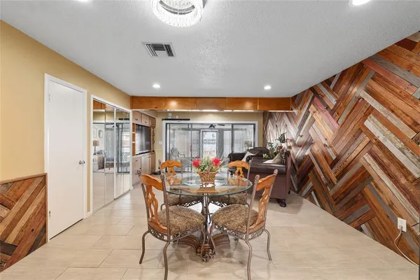 a view of a dining room with furniture