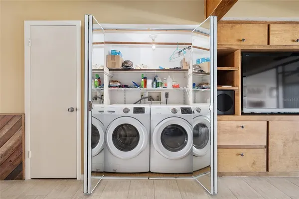 a utility room with dryer and washer