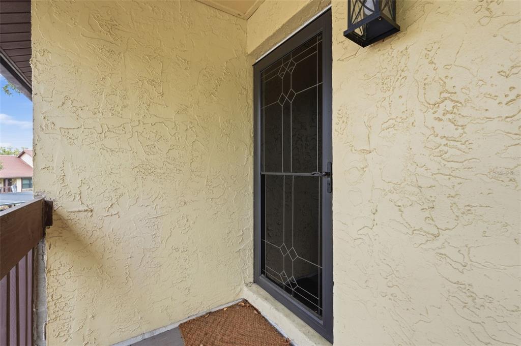 7650 Forest Trail, Unit 6 Port Richey, FL 34668 - Photo 2 of 37 a view of door