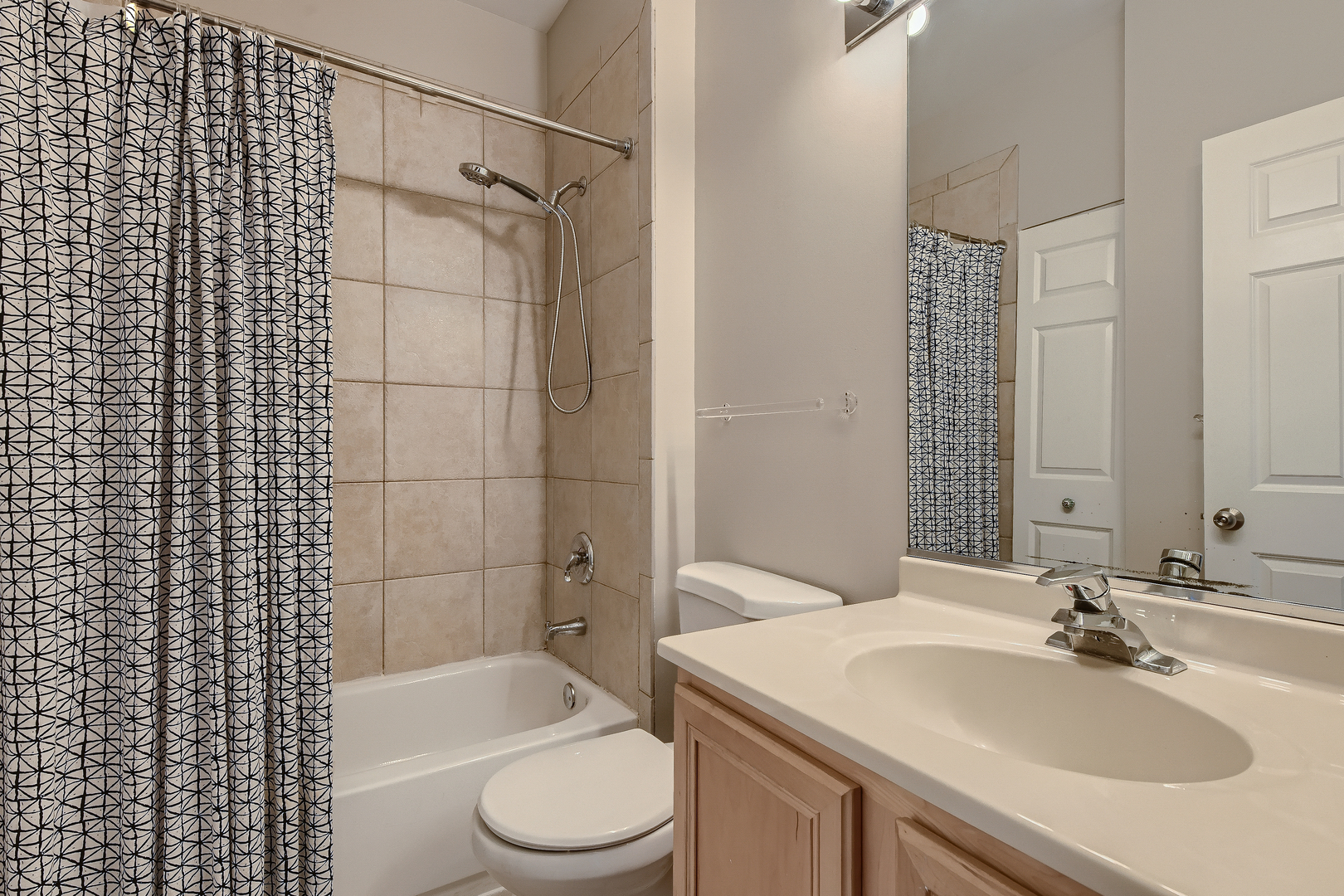 1318 West Grenshaw Street, Unit B Chicago, IL 60607 - Photo 12 of 16 a bathroom with a sink toilet and shower