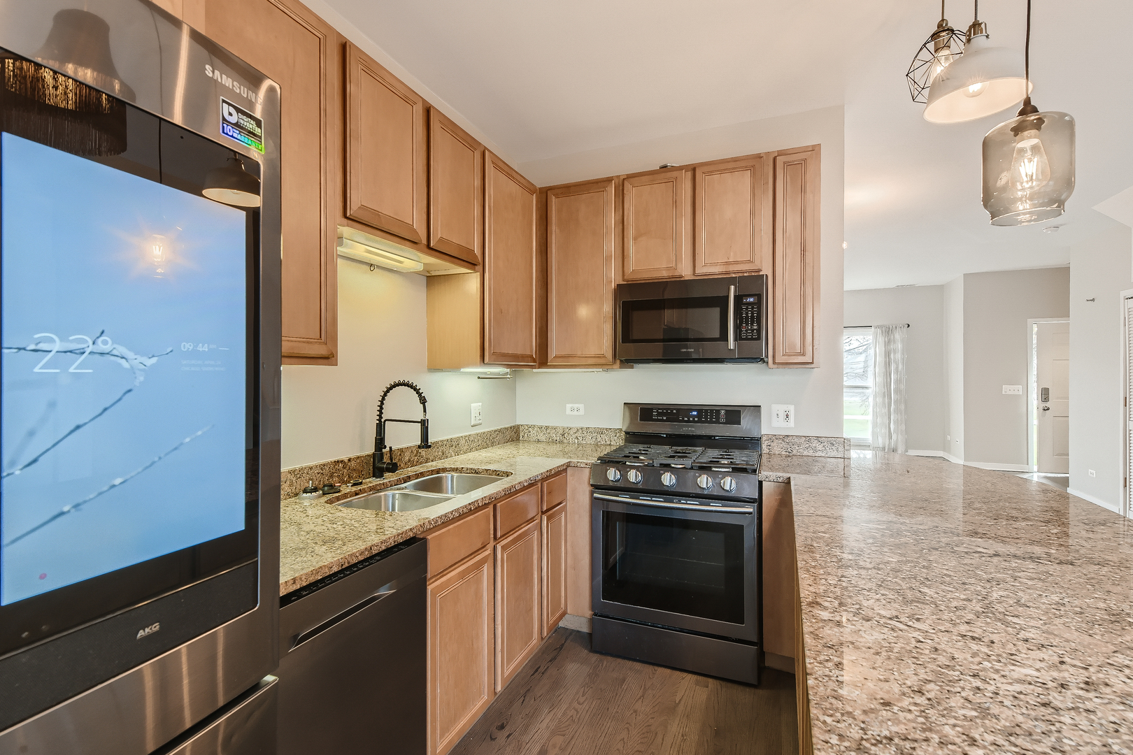 1318 West Grenshaw Street, Unit B Chicago, IL 60607 - Photo 7 of 16 a kitchen with a stove and a sink
