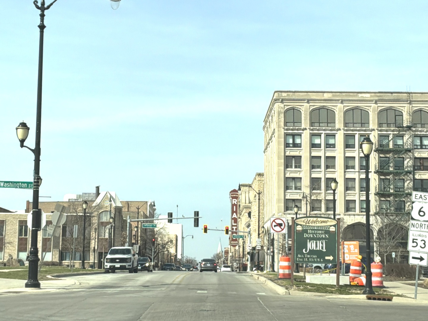 224 East Cass Street, Unit 2R Joliet, IL 60432 - Photo 15 of 24 a view of a city with tall buildings