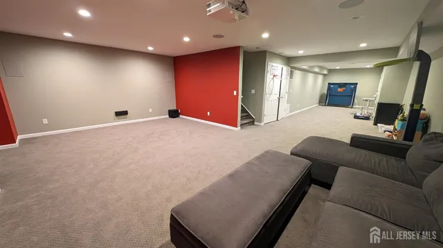 a living room with furniture and a couch