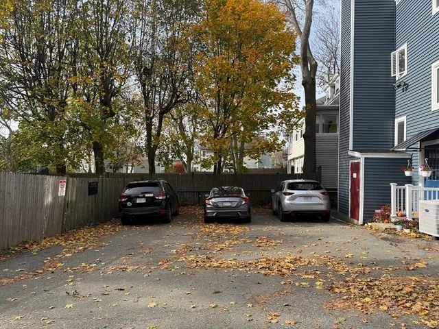 an aerial view of a house with a ocean view