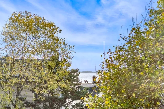 a kitchen with stainless steel appliances granite countertop a refrigerator microwave and sink