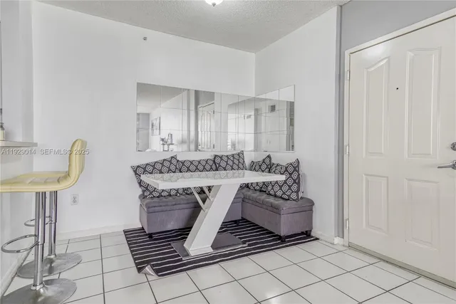 a living room with a couch and a table