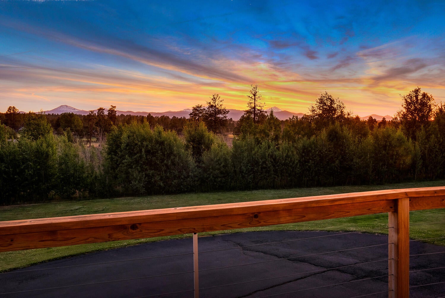 60470 Arnold Market Road Bend, OR 97702 - Photo 50 of 53 front deck view twilight
