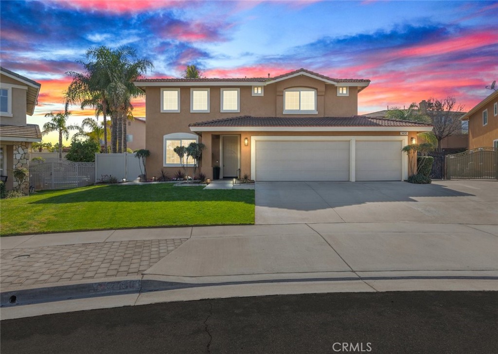 1430 Baldwin Drive Corona, CA 92881 - Photo 1 of 61 a front view of a house with a yard and garage