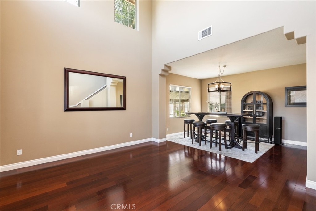 1430 Baldwin Drive Corona, CA 92881 - Photo 11 of 61 a view of a livingroom with furniture wooden floor and windows