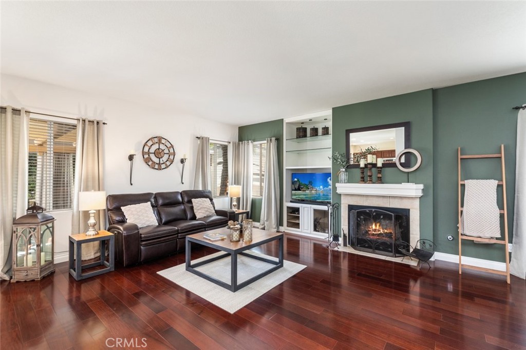 1430 Baldwin Drive Corona, CA 92881 - Photo 16 of 61 a living room with furniture and a fireplace