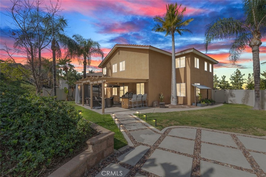 1430 Baldwin Drive Corona, CA 92881 - Photo 2 of 61 a front view of a house with a yard and garage