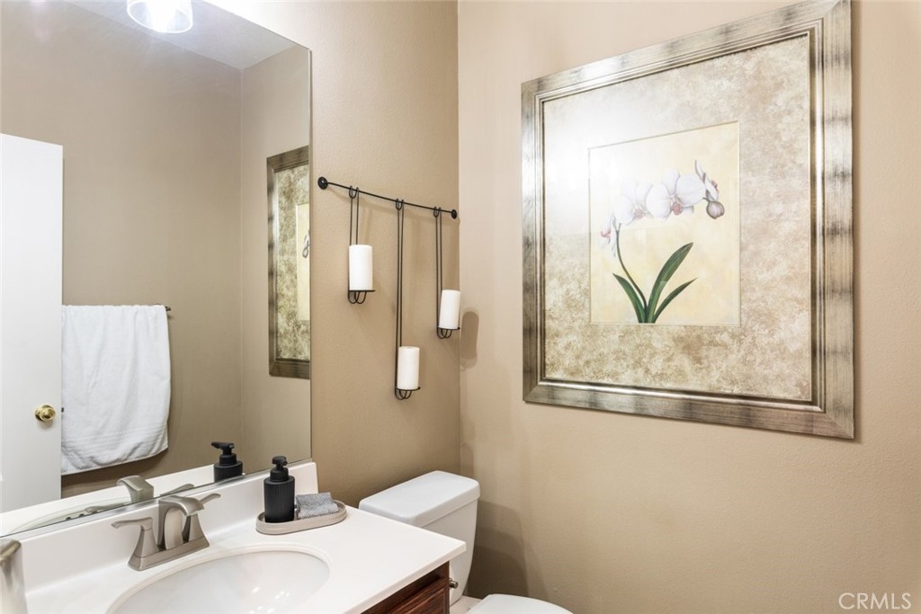 1430 Baldwin Drive Corona, CA 92881 - Photo 25 of 61 a bathroom with a sink and a mirror