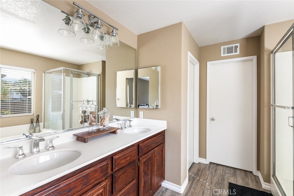 1430 Baldwin Drive Corona, CA 92881 - Photo 29 of 61 a bathroom with a double vanity sink mirror and double