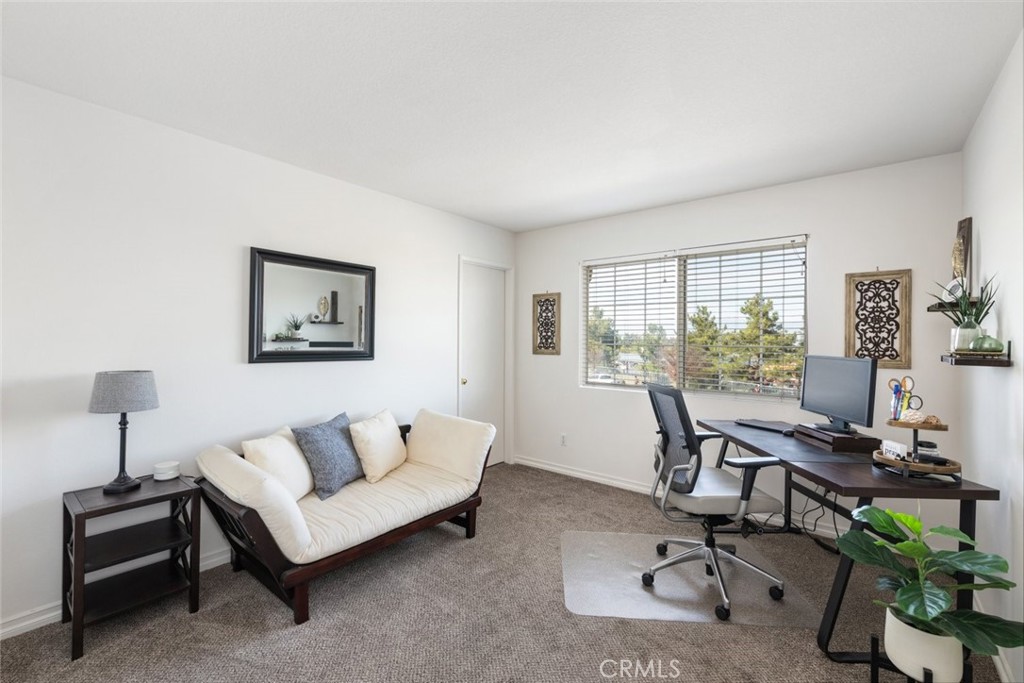 1430 Baldwin Drive Corona, CA 92881 - Photo 33 of 61 a view of a livingroom with workspace and a couch