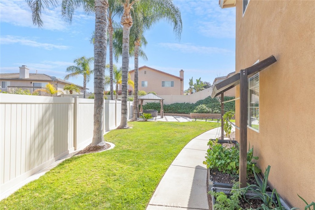 1430 Baldwin Drive Corona, CA 92881 - Photo 37 of 61 The side yard offers a perfect space for gardening.