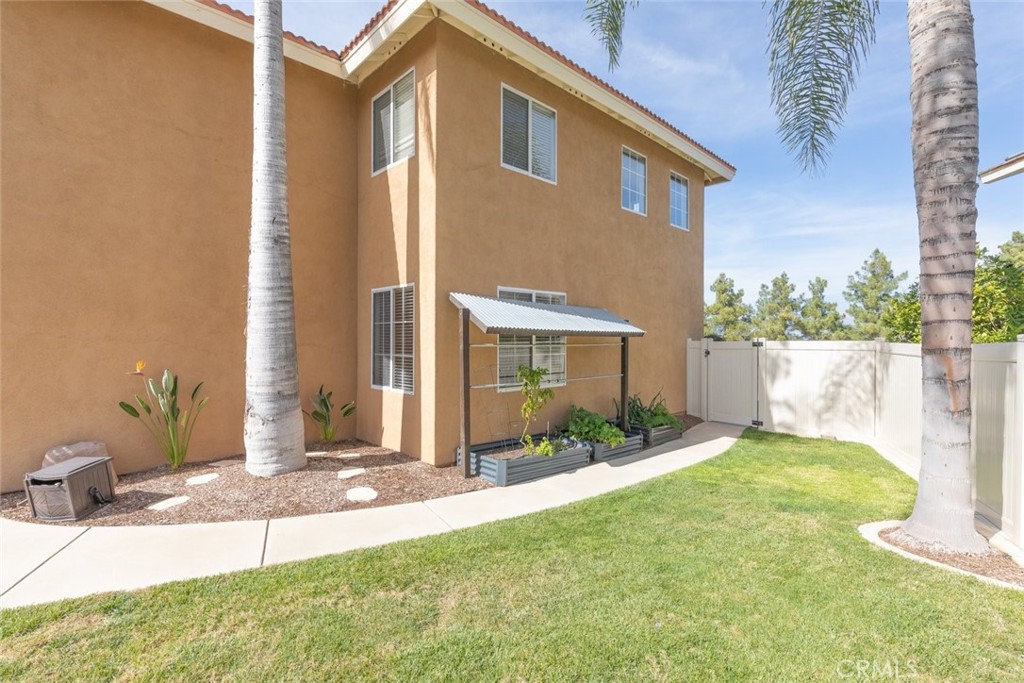 1430 Baldwin Drive Corona, CA 92881 - Photo 39 of 61 a backyard of a house with yard and outdoor seating