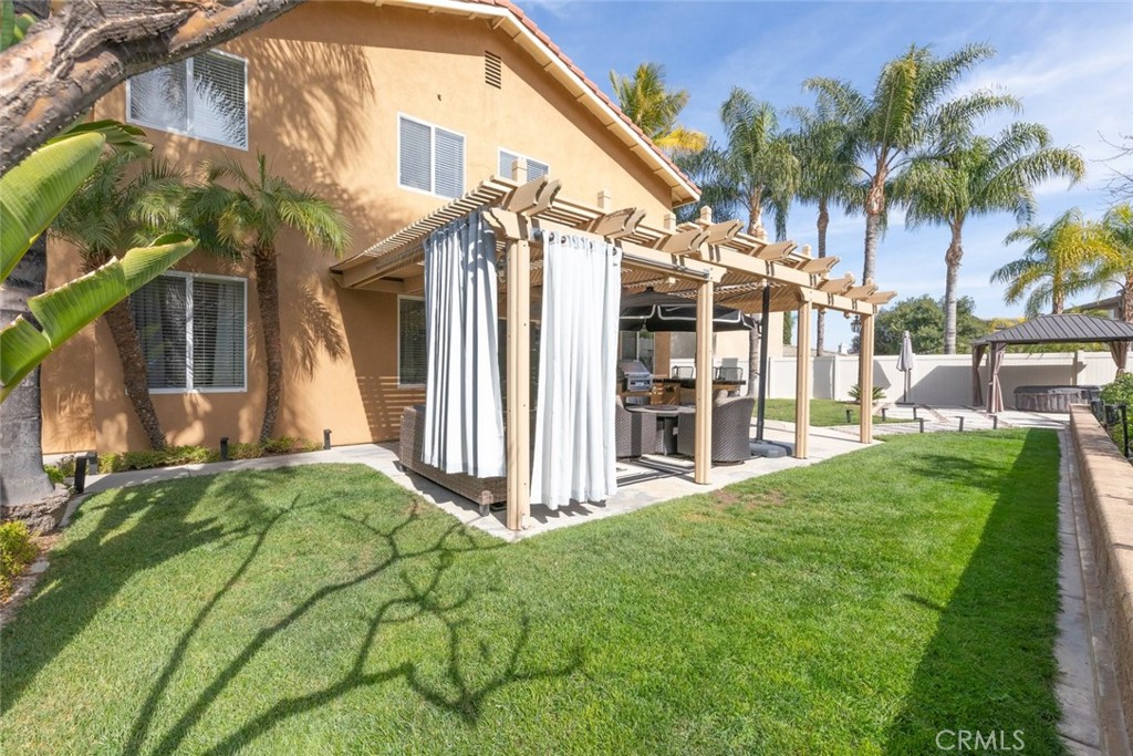 1430 Baldwin Drive Corona, CA 92881 - Photo 48 of 61 a view of a house with a yard