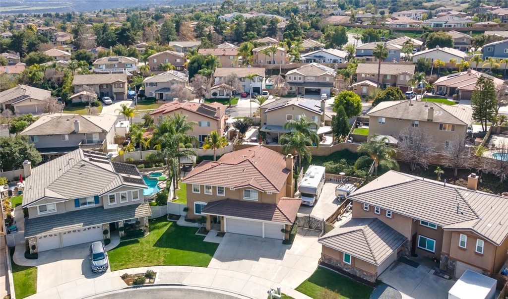 1430 Baldwin Drive Corona, CA 92881 - Photo 53 of 61 an aerial view of residential houses with outdoor space and parking