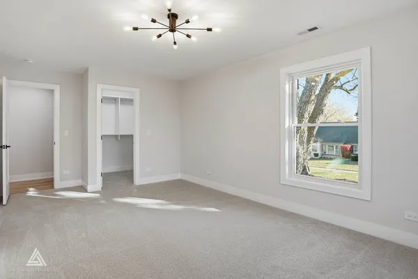 a view of an empty walk in closet