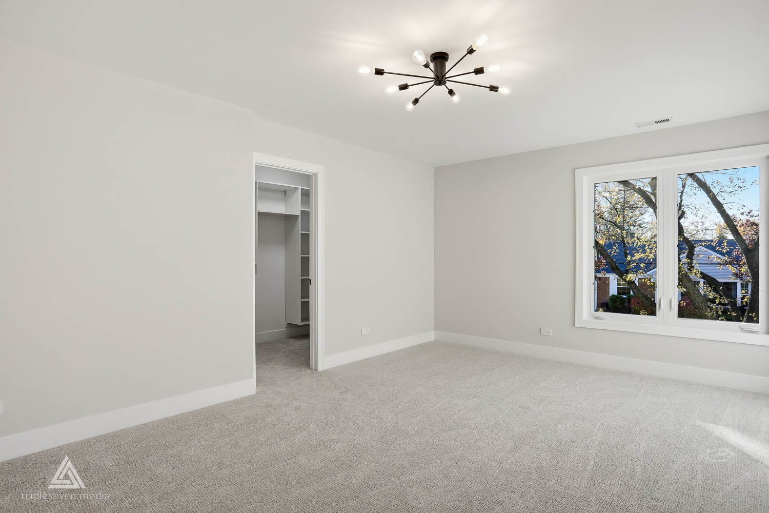 500 North Fairview Avenue Mount Prospect, IL 60056 - Photo 38 of 49 an empty room with windows and ceiling fan
