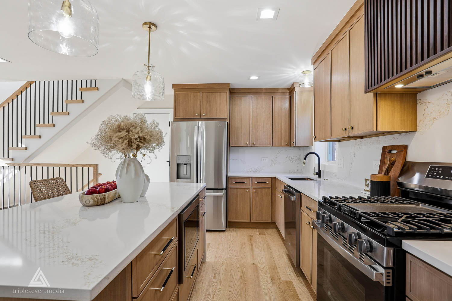 500 North Fairview Avenue Mount Prospect, IL 60056 - Photo 10 of 49 a kitchen with stainless steel appliances granite countertop a stove a sink dishwasher and a refrigerator with wooden floor
