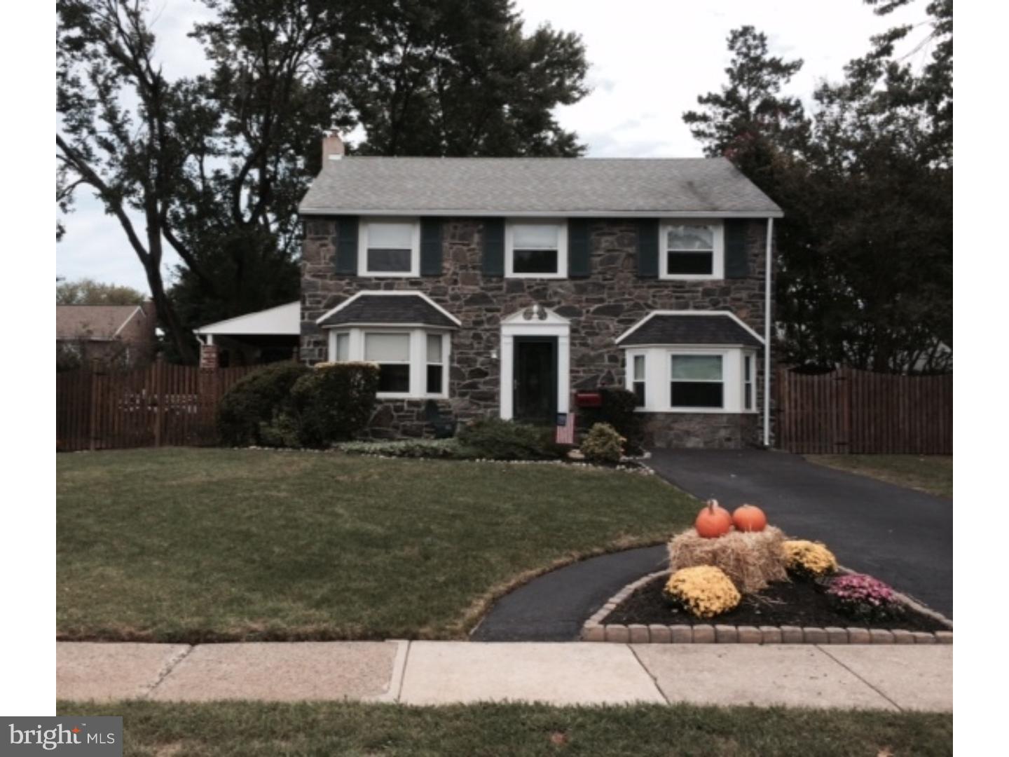 737 Hilltop Road Springfield, PA 19064 - Photo 1 of 24 a front view of a house with a yard