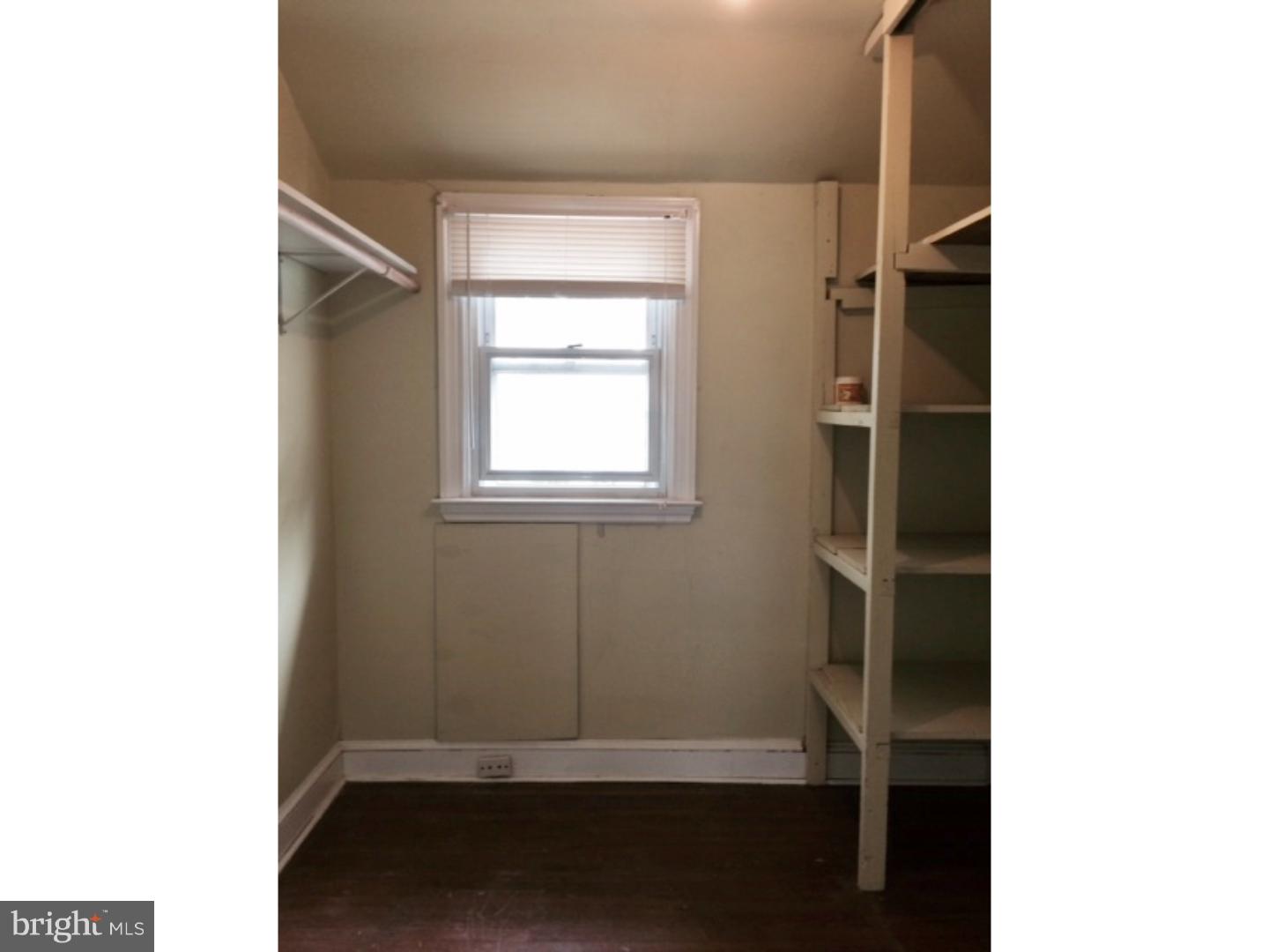 737 Hilltop Road Springfield, PA 19064 - Photo 17 of 24 a room that has a window in it
