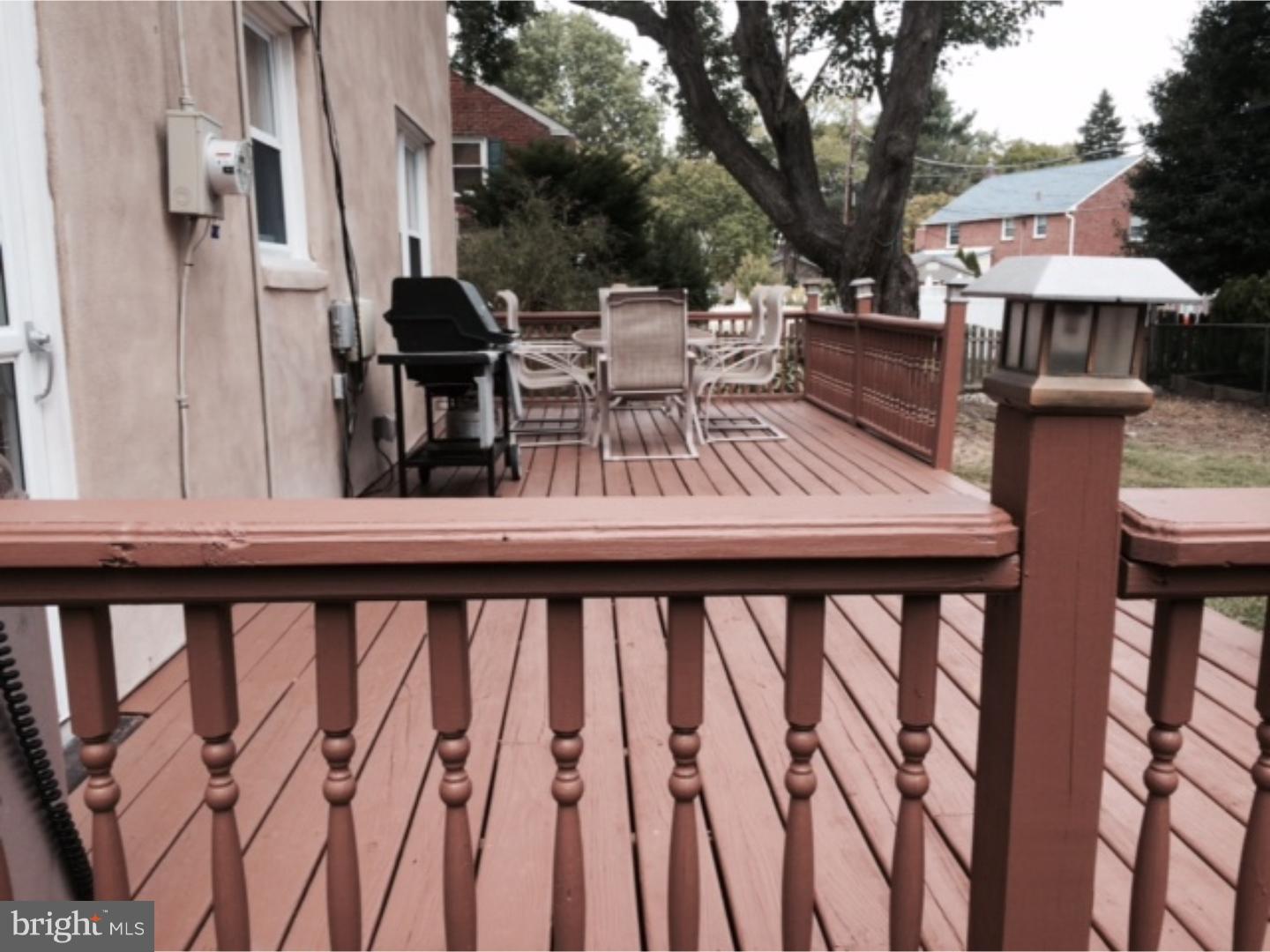 737 Hilltop Road Springfield, PA 19064 - Photo 20 of 24 a view of balcony with furniture and wooden floor
