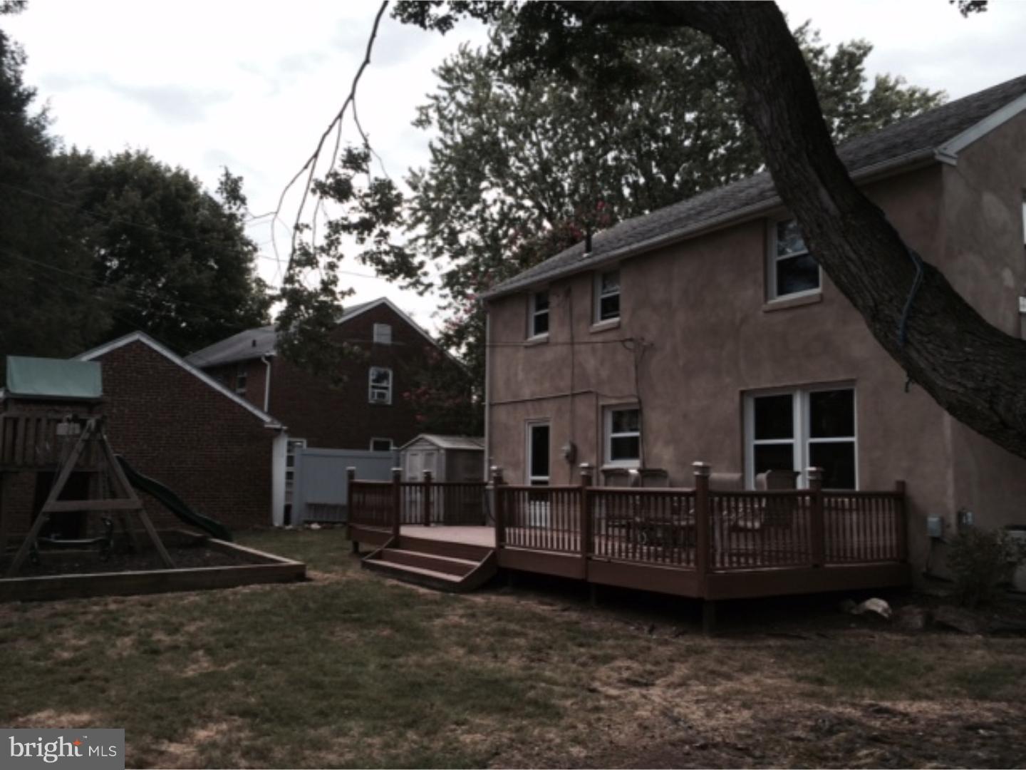 737 Hilltop Road Springfield, PA 19064 - Photo 24 of 24 a view of a house with a yard