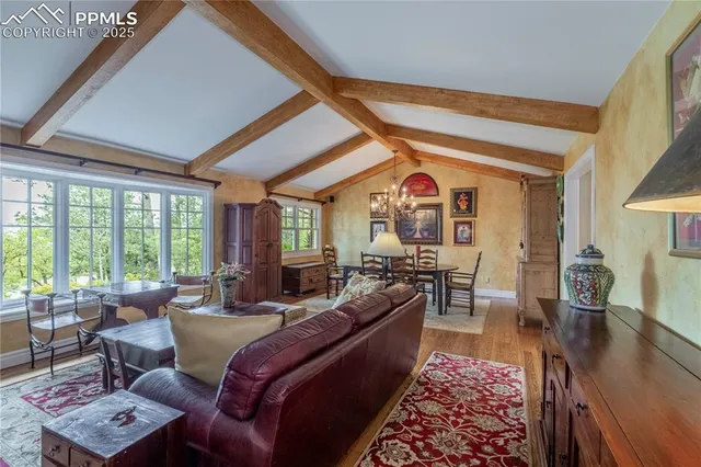 a view of a dining room with furniture window and outside view