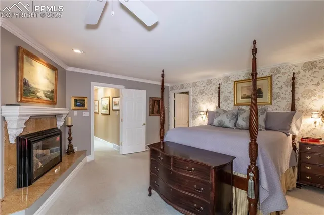 a large bedroom with a large bed and furniture