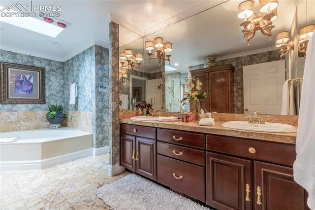 a bathroom with a tub a toilet and a shower