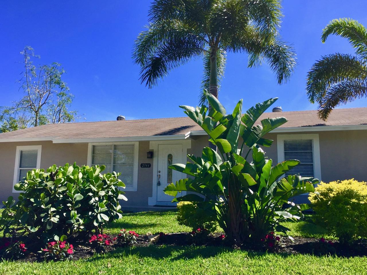 2744 Worcester Road Lake Worth, FL 33462 - Photo 14 of 16 14front landscape