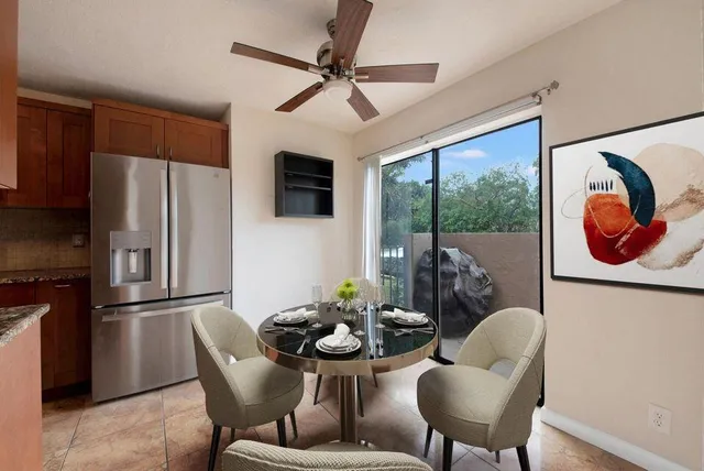 a view of a kitchen from the hallway