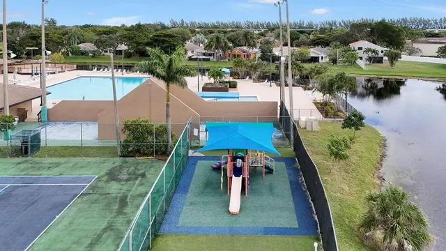 an aerial view of a house with outdoor space