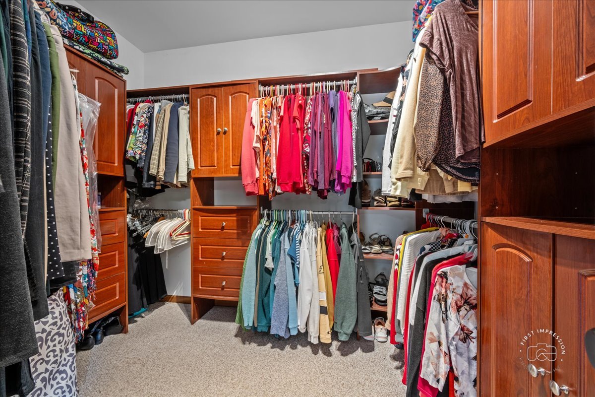 2519 Imgrund Road North Aurora, IL 60542 - Photo 16 of 33 a view of walk in closet with clothes