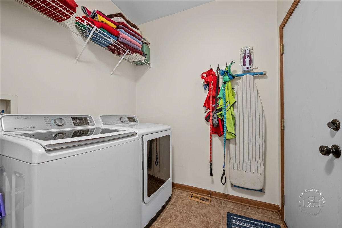 2519 Imgrund Road North Aurora, IL 60542 - Photo 23 of 33 a utility room with dryer and washer