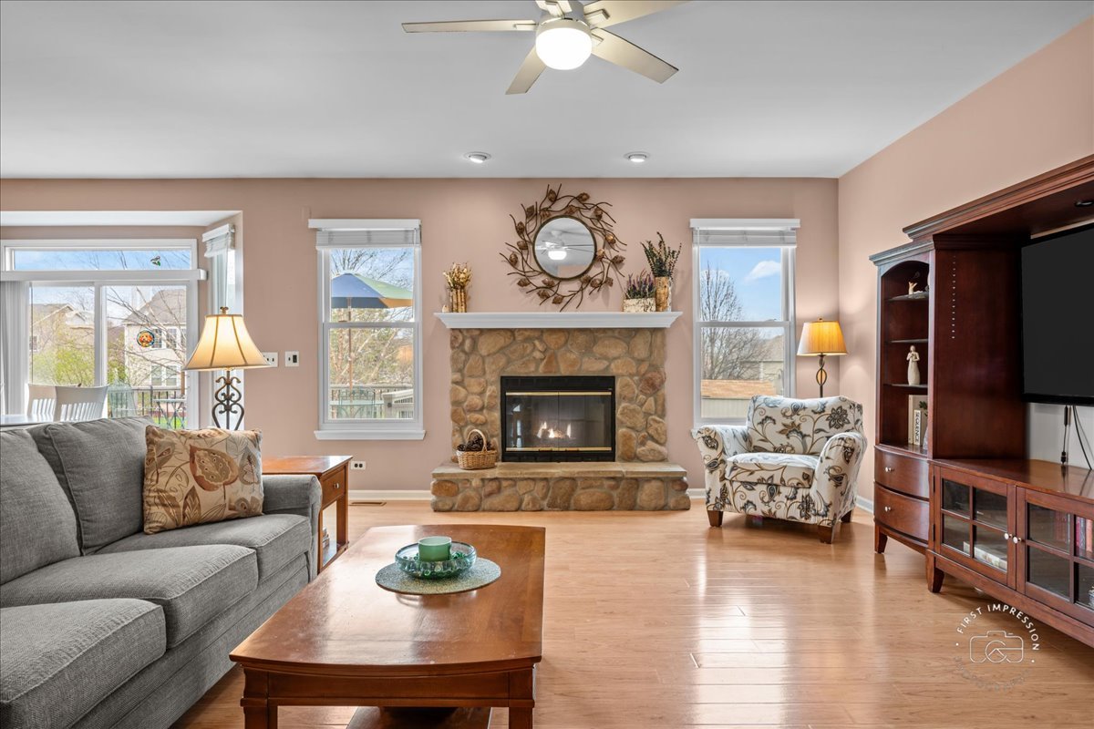 2519 Imgrund Road North Aurora, IL 60542 - Photo 6 of 33 a living room with furniture and a fireplace