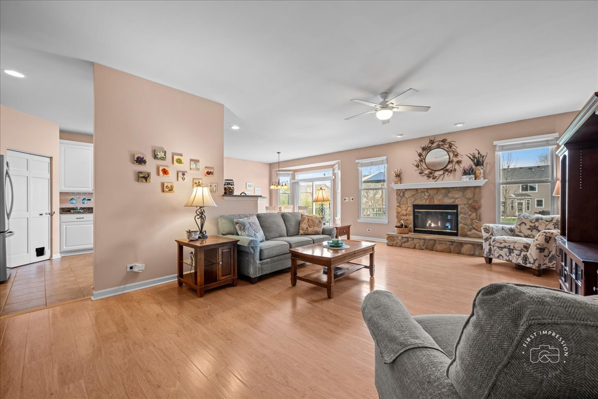2519 Imgrund Road North Aurora, IL 60542 - Photo 7 of 33 a living room with furniture and a fireplace