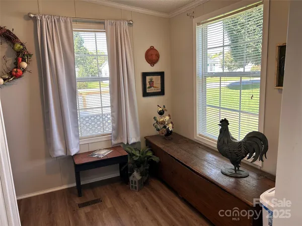 a room with furniture and a window