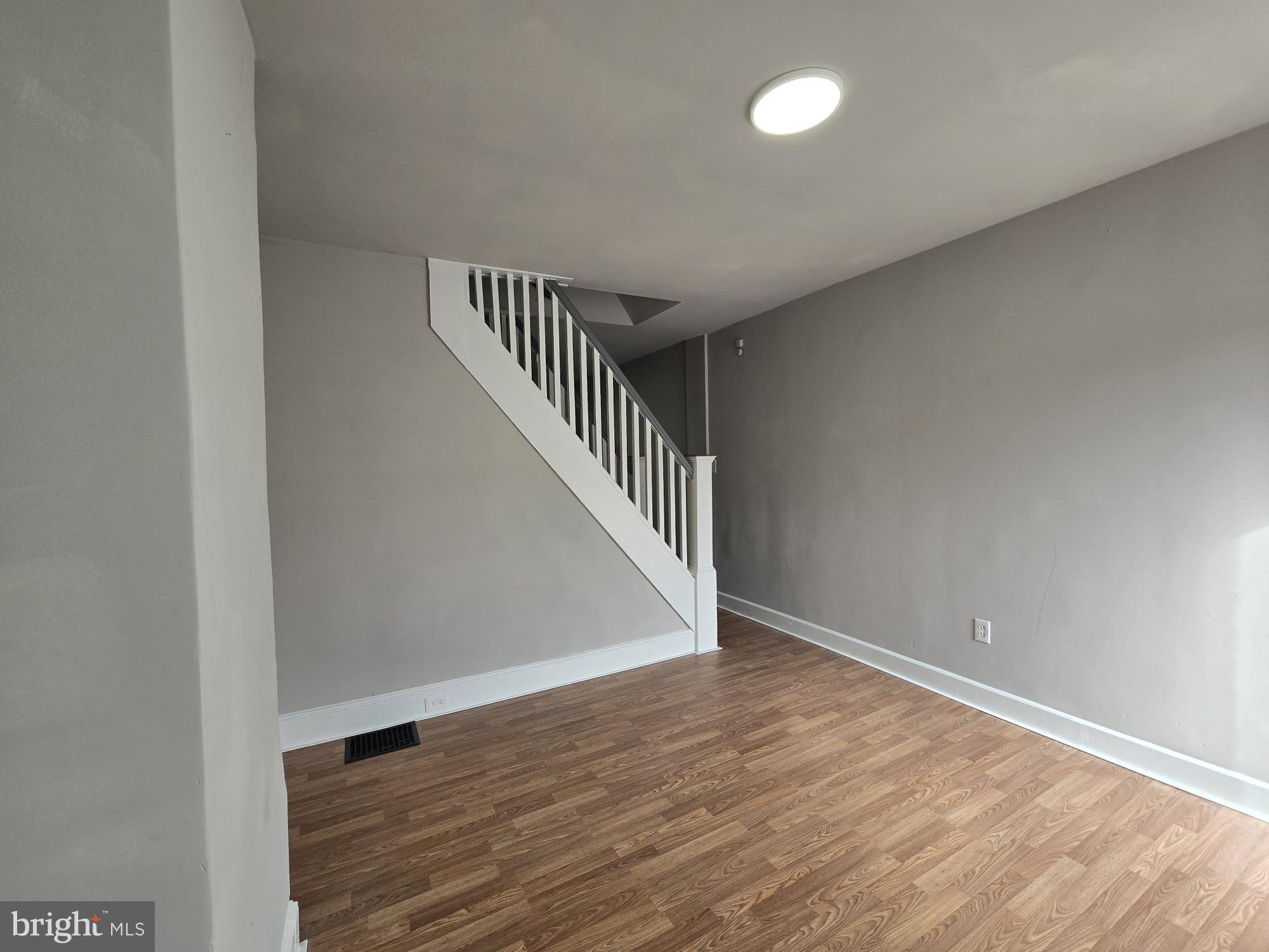 6138 North Lambert Street Philadelphia, PA 19138 - Photo 5 of 25 a view of an empty room with wooden floor